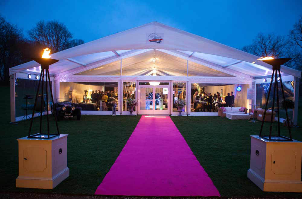a-Portico-entrance-Clear-gable-end-and-windows-flambeaux-Pink-entrance-carpet-now1