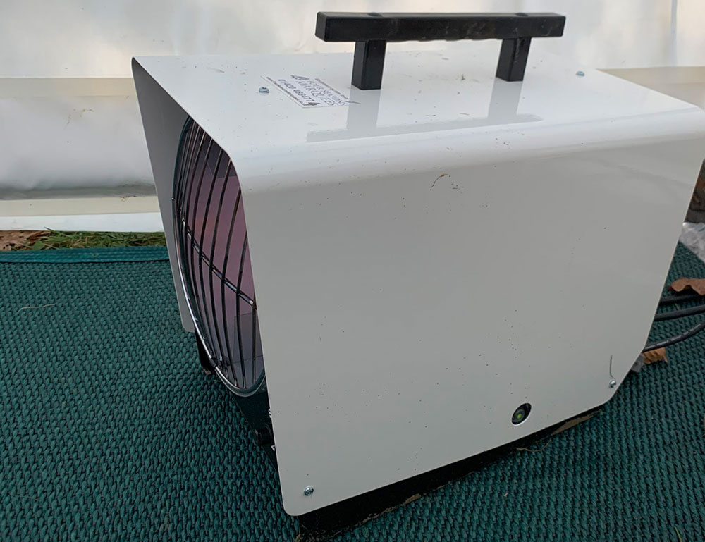 Portable thermostatic space heater for maintaining comfortable temperatures inside a marquee.