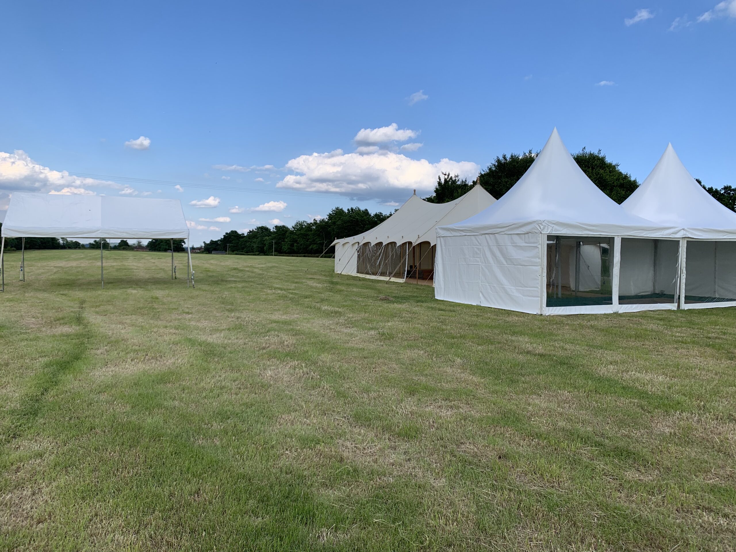 Pagoda marquee venue on open field site for private parties and outdoor events